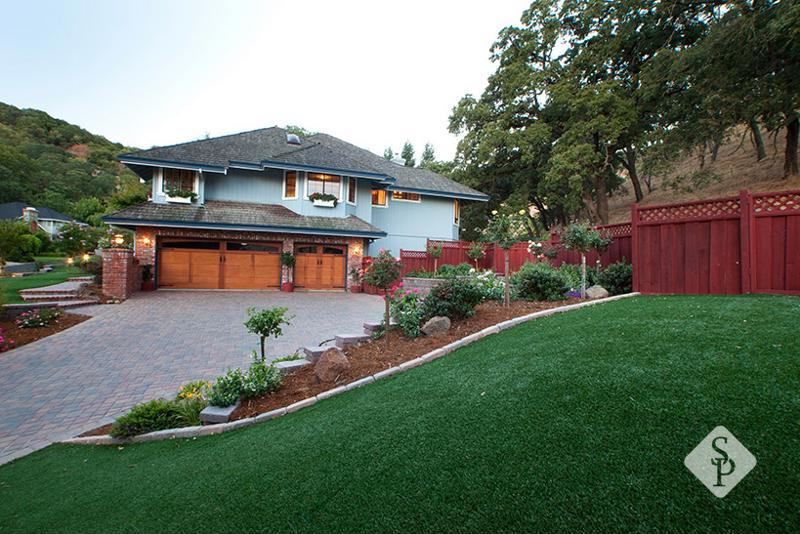 yard with paver driveway