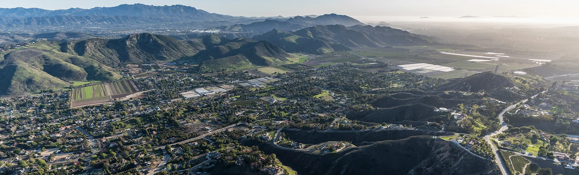 Afternoon aerial view of Santa Rosa Valley homes and hillsides in scenic Camarillo California.