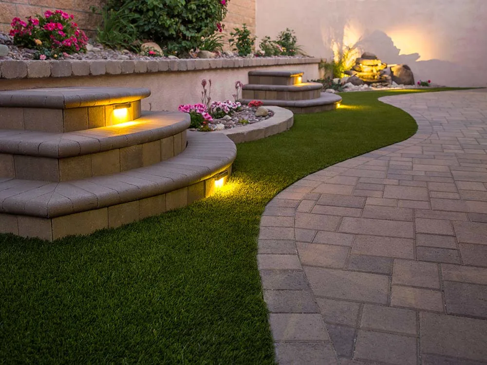 Outdoor lighting, artificial turf, paver walkway & steps