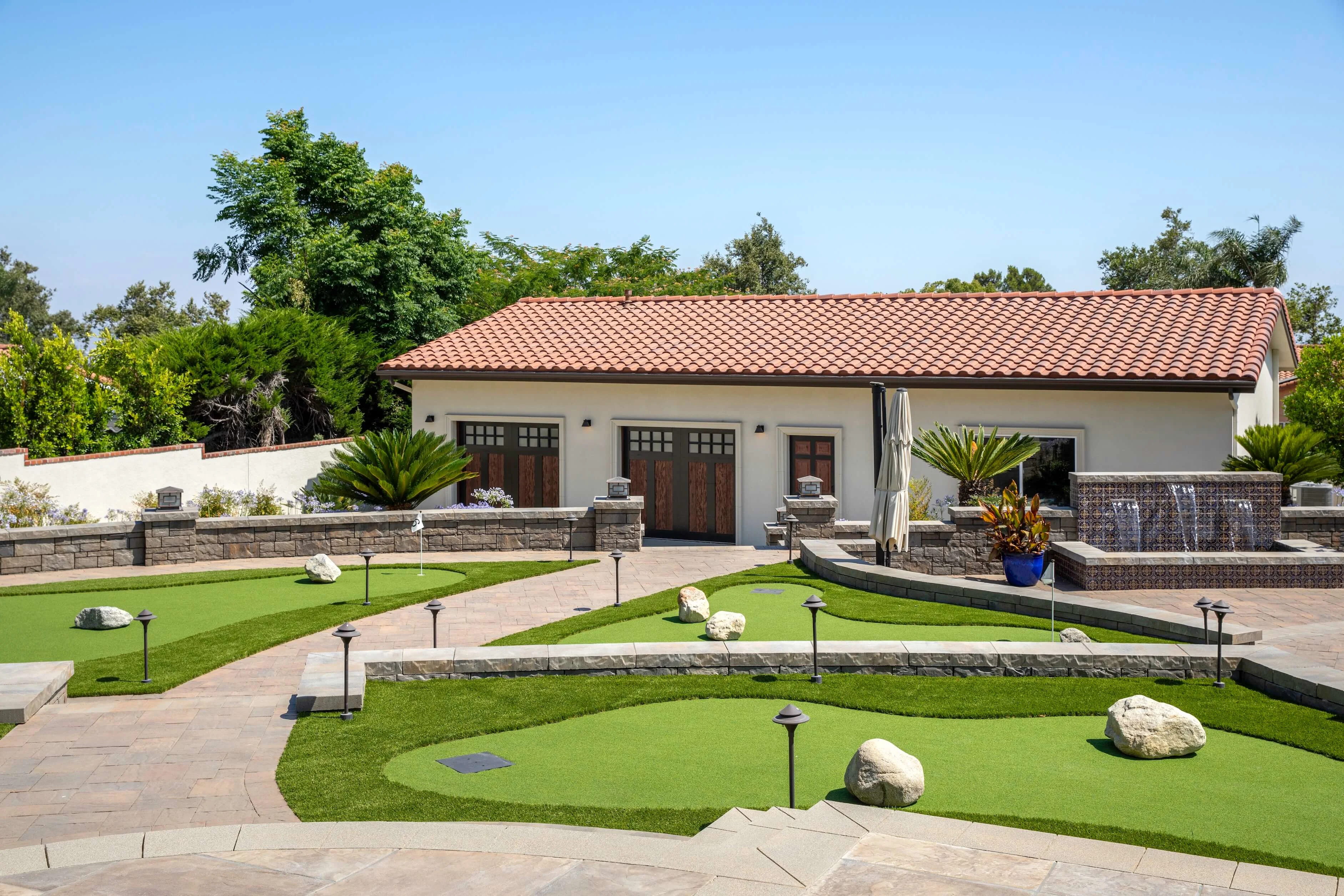 Fehlman backyard after picture with water feature and putting greens