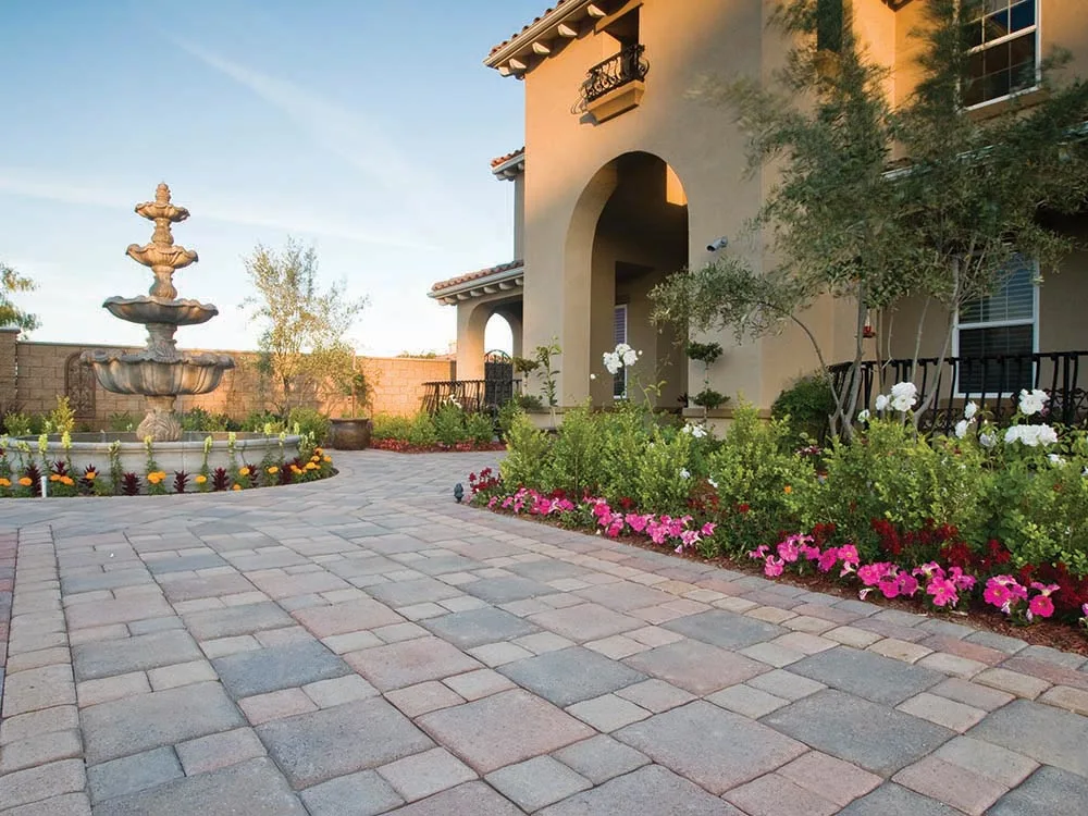 Paving stone patio courtyard with water fountain