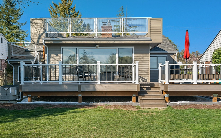 Two story home in Seattle with double decker deck built by System Pavers.