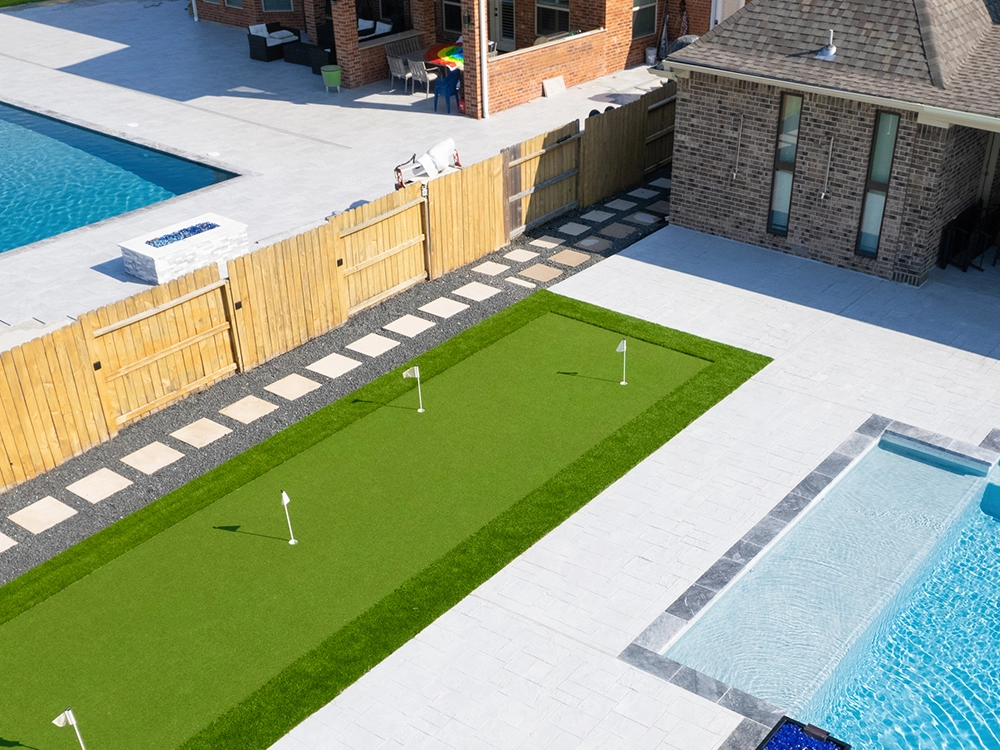 Putting green by a pool in Texas. 