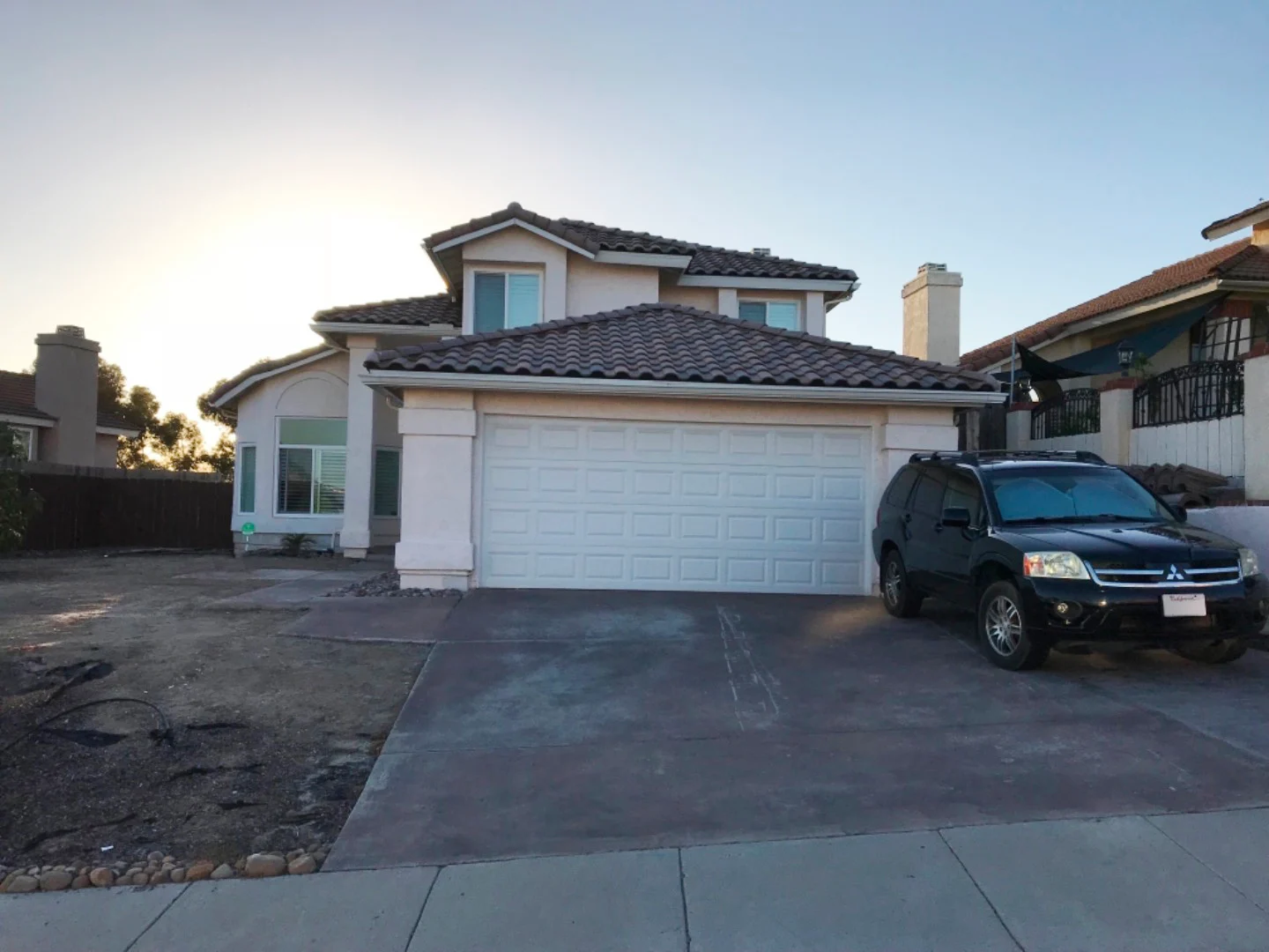 Hillside home before outdoor renovations