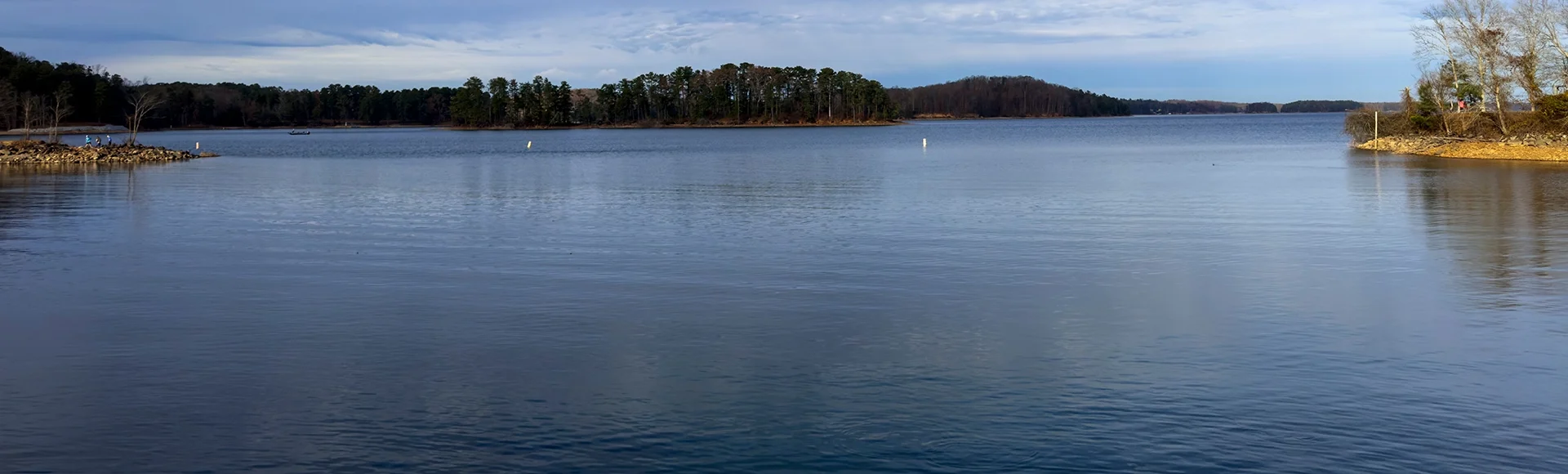 This is the view from the West Bank Park on Lake Lanier in Forsyth County, Georgia. There are a few clouds on the horizon but it’s a very sunny day.