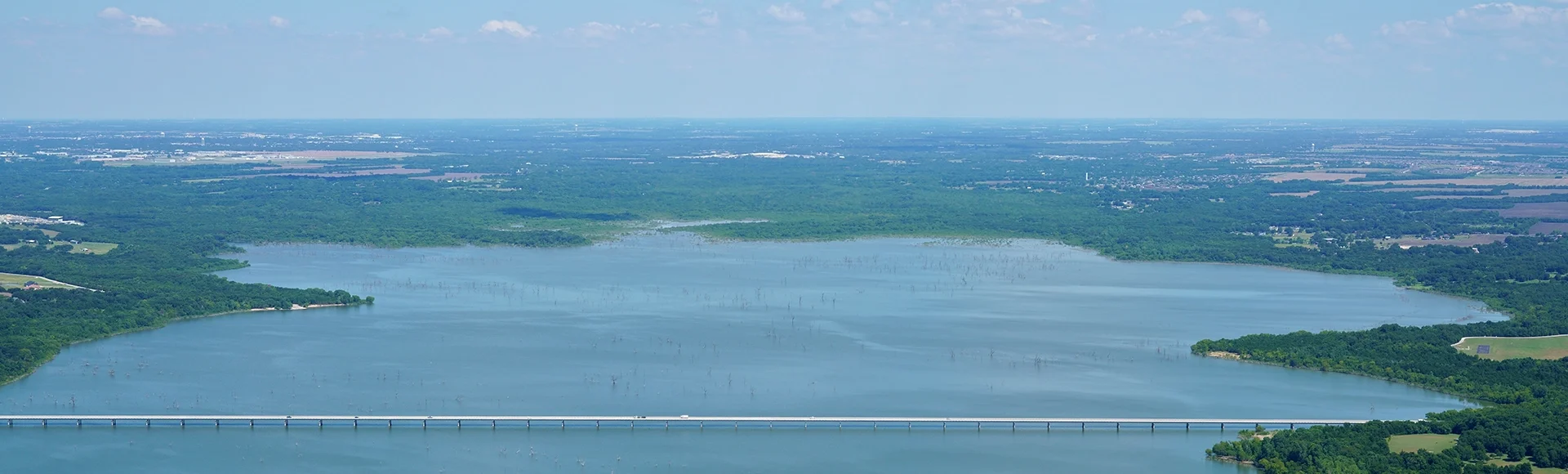 Aerial view of Lavon Lake, Texas, USA. East Lucas Road Bridge over Lake Lavon. Fresh water reservoir, located in Collin County, part of the Dallas-Fort Worth-Arlington, Texas Metropolitan Area