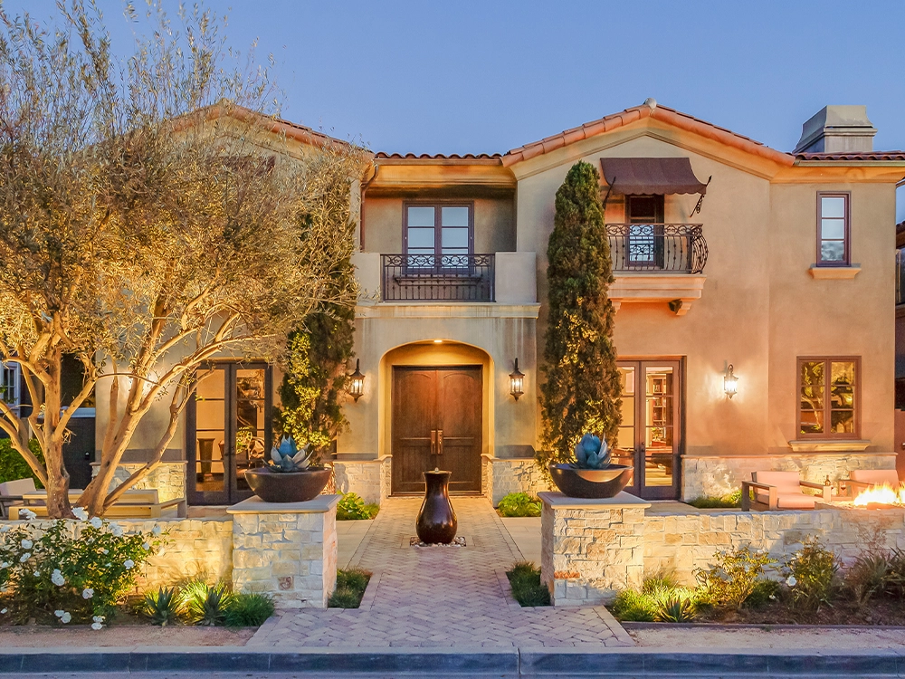 Front of a home with hardscape detail that demonstrates what System Pavers can do with a small space to transform a home. 