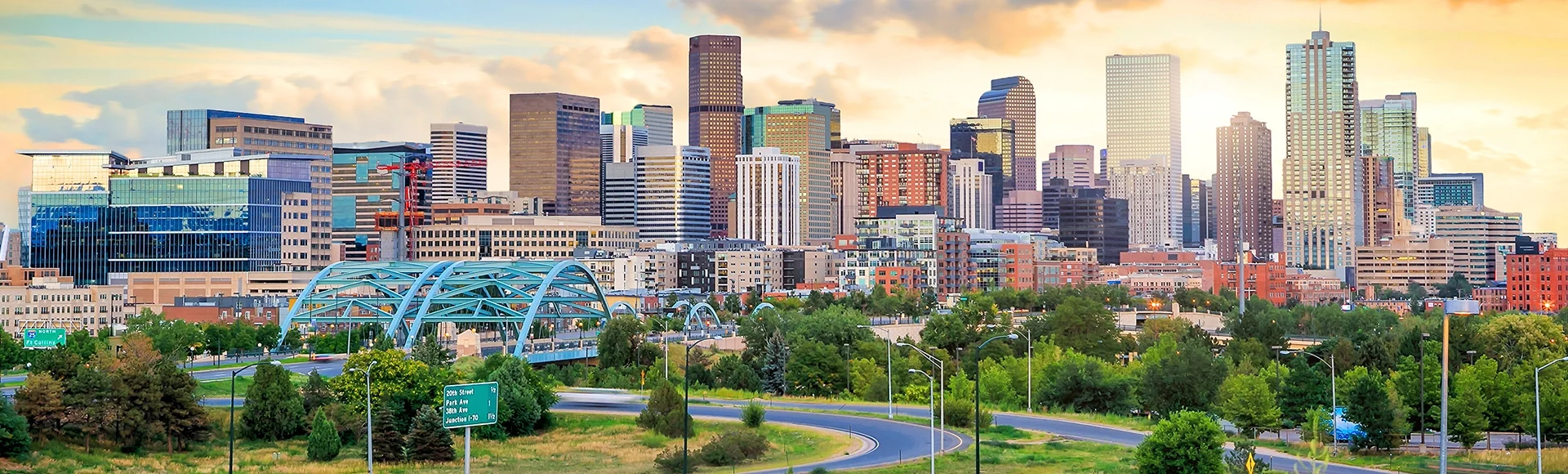 Panorama of Denver skyline at twilight.
