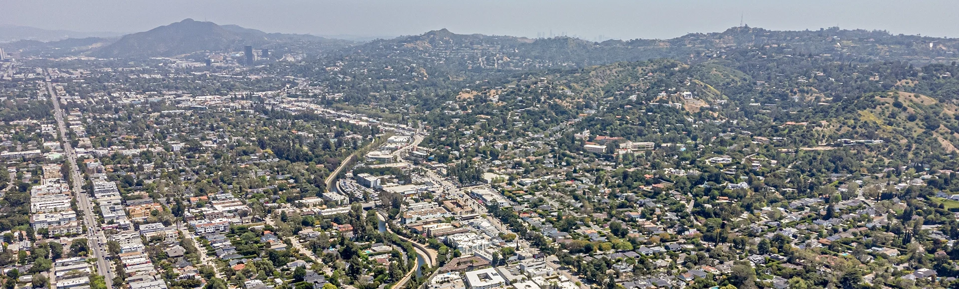 Studio City, LA Los Angeles County, CA, California, Drone City View toward Studio City, LA River, Ventura Blvd, with Homes, Houses, Streets, Apartments, Buildings