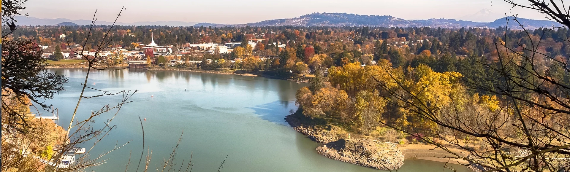 Willamette river in sunny autumn day. View from above. Milwaukie City, Oregon, on the background