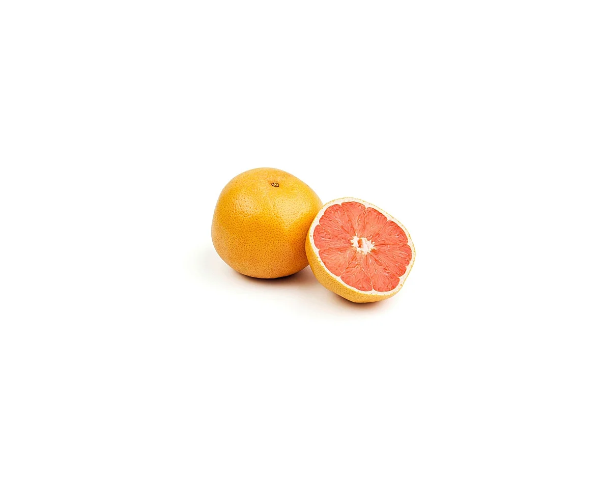 Grapefruit rosé ganz und halbiert