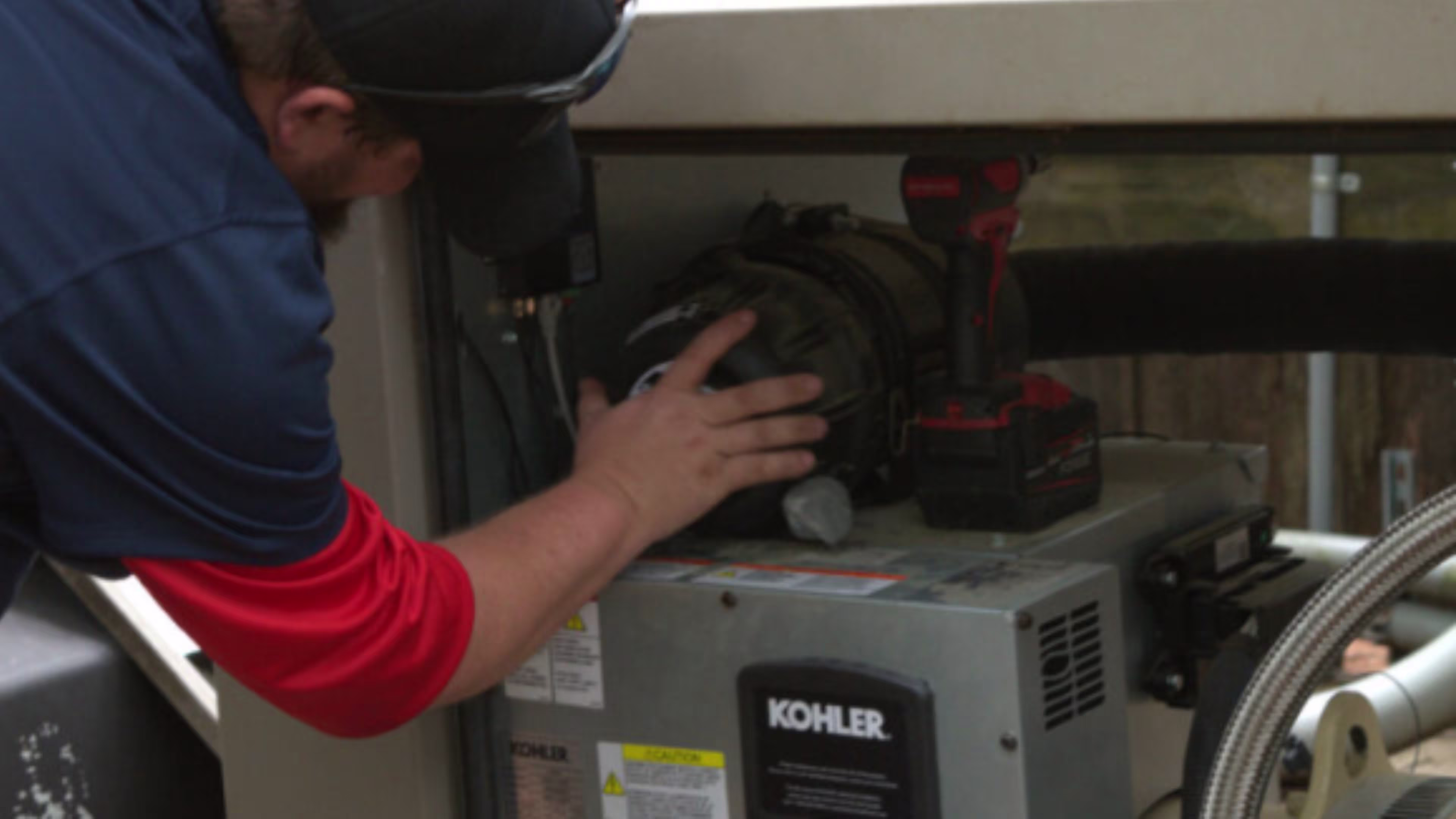 Professional working on generator