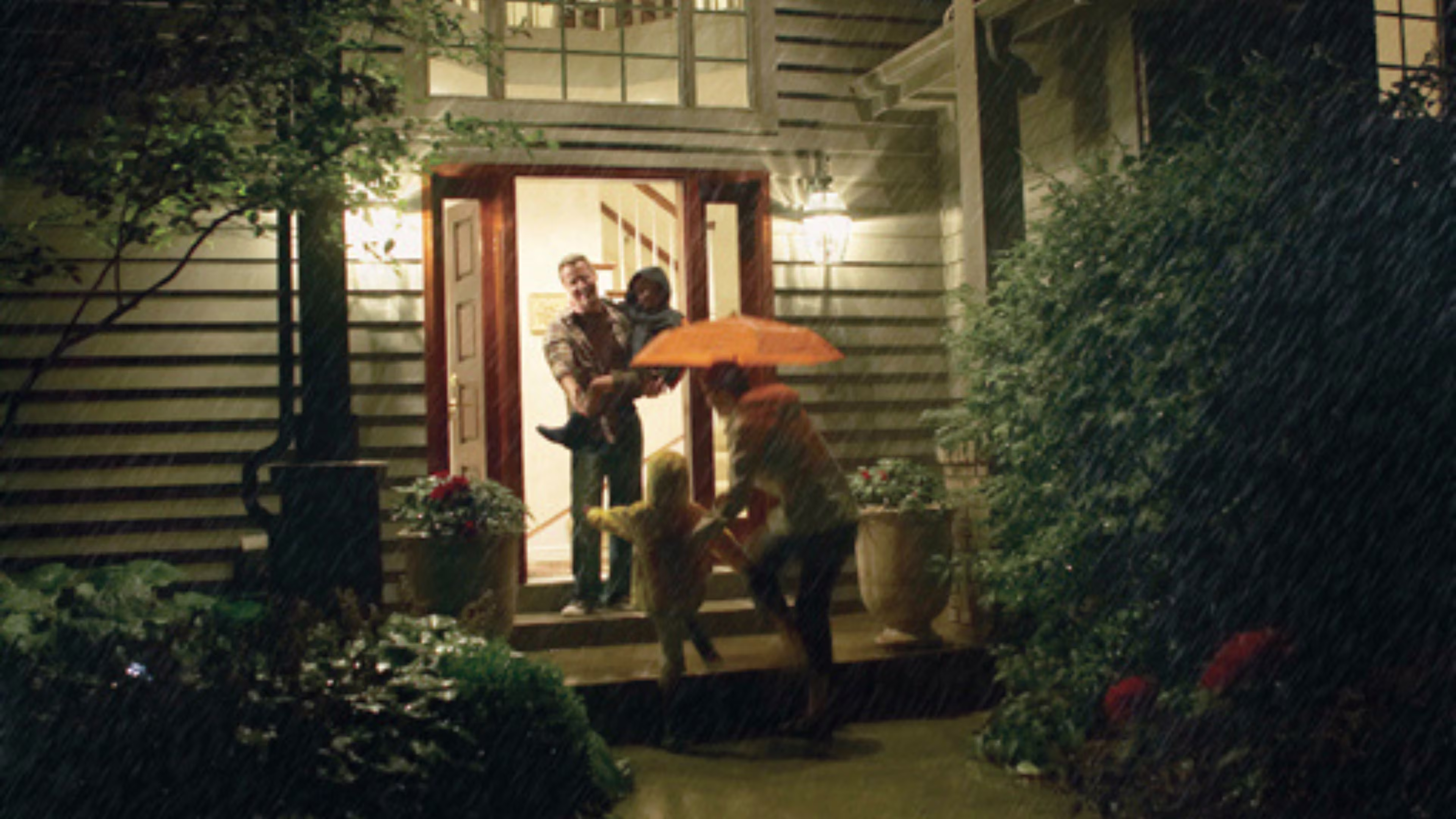 People at front door at a rainy day
