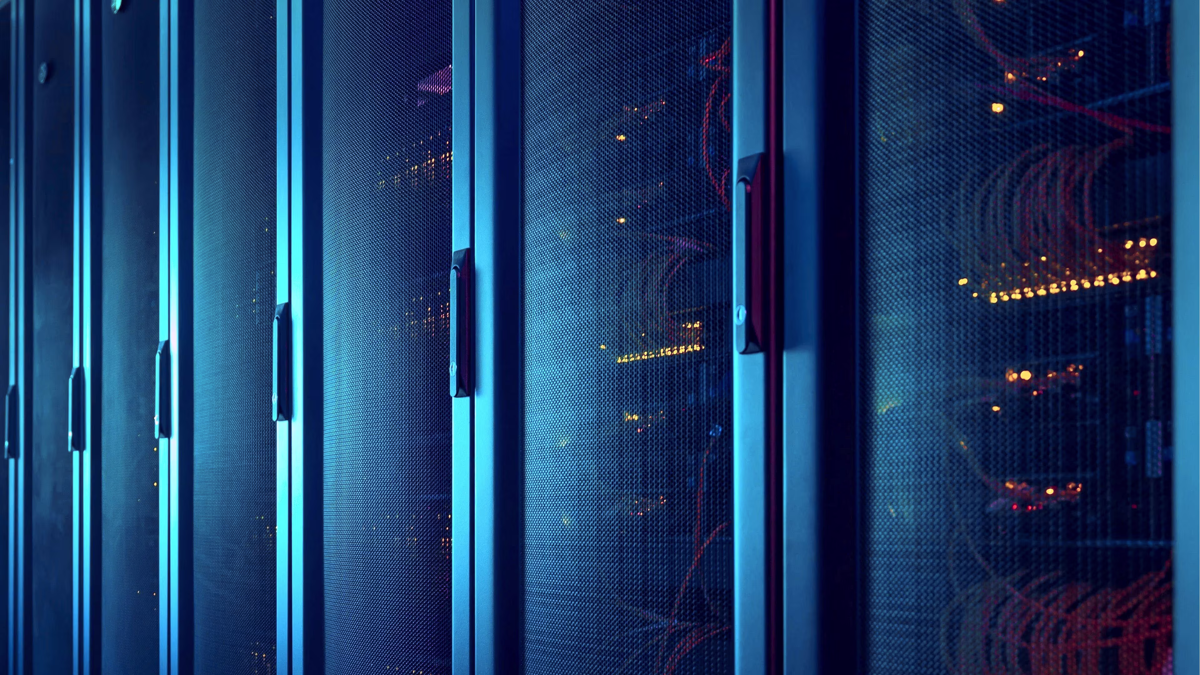 Zoom in of data center enclosure doors in blue tones.