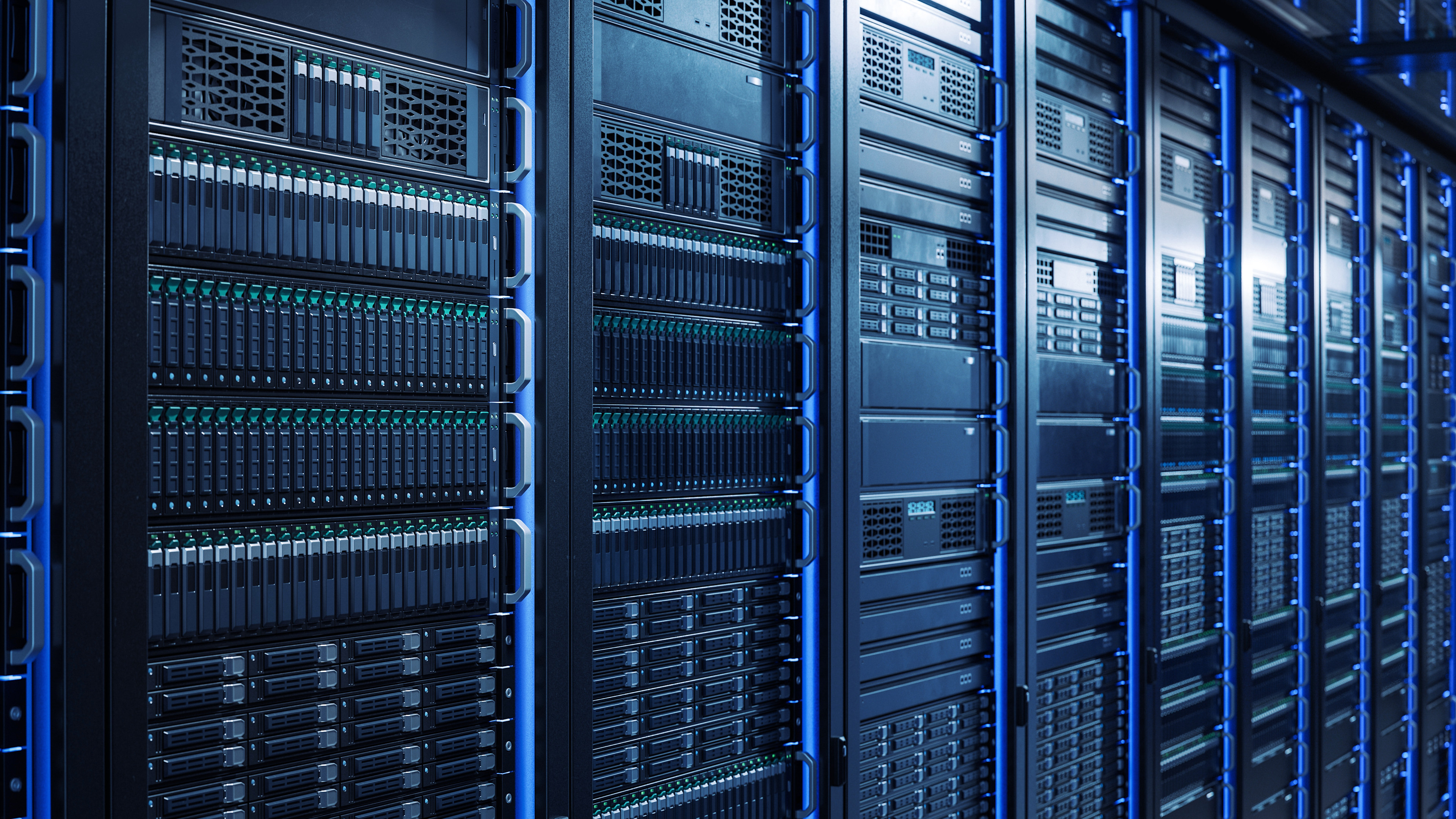 Close up image of servers in the slots of a data center rack enclosure