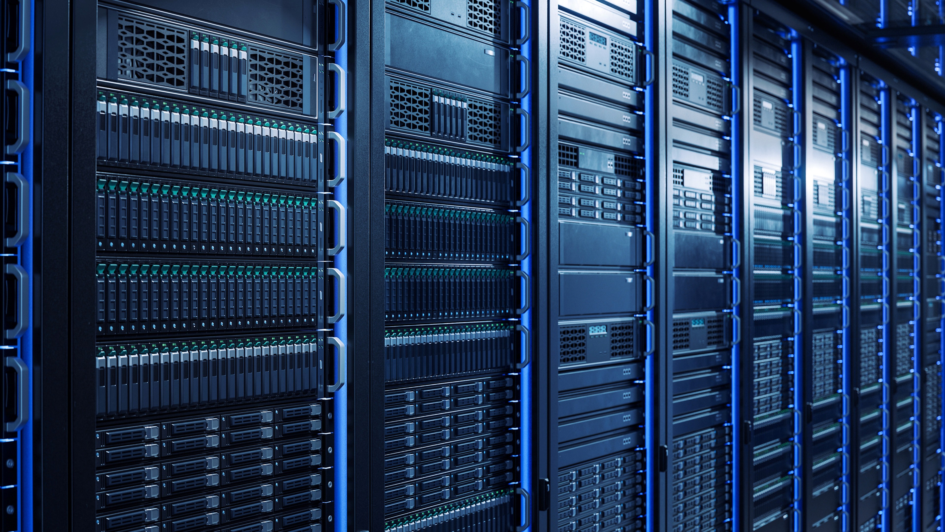 Close up image of servers in the slots of a data center rack enclosure