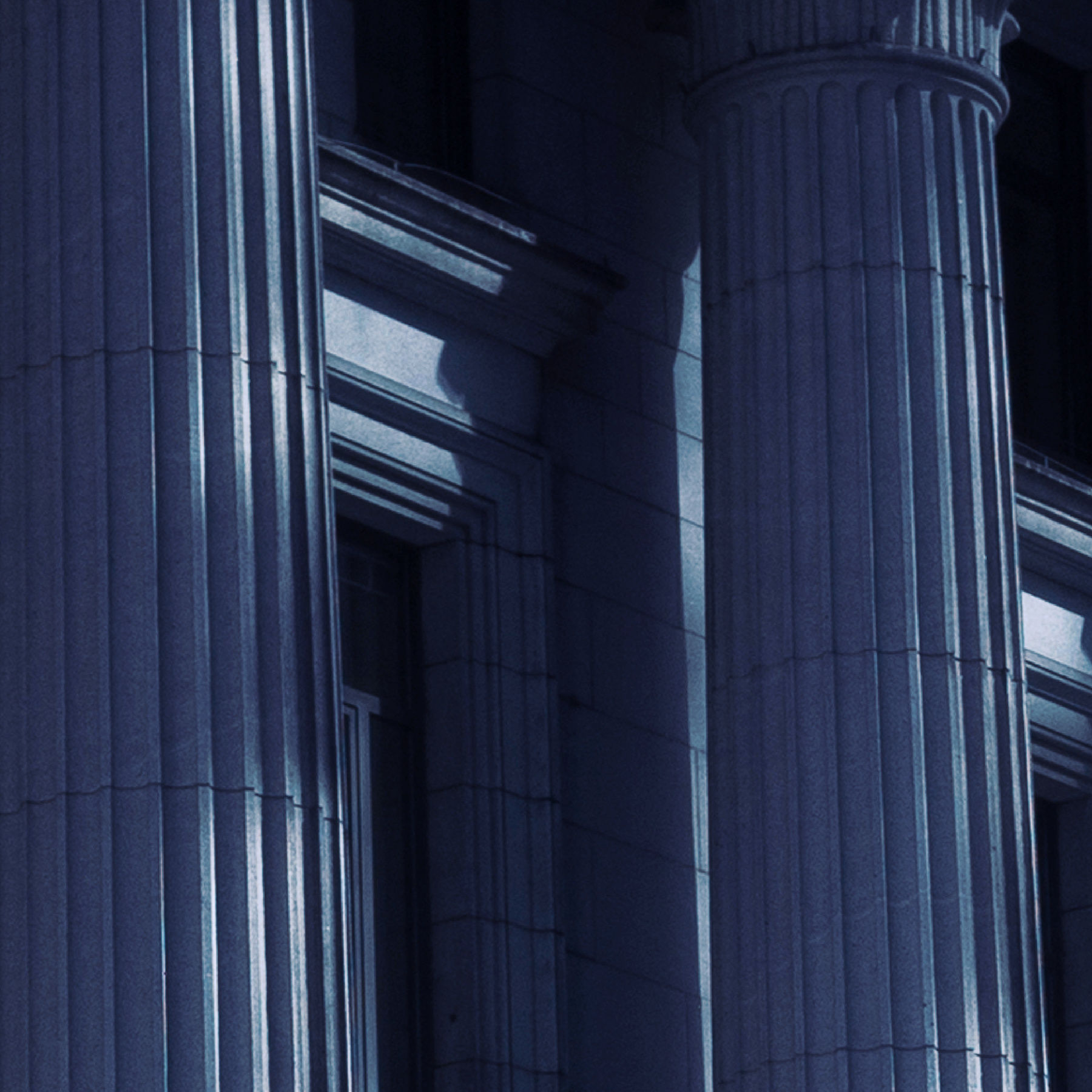 Zoom in of columns of a building.