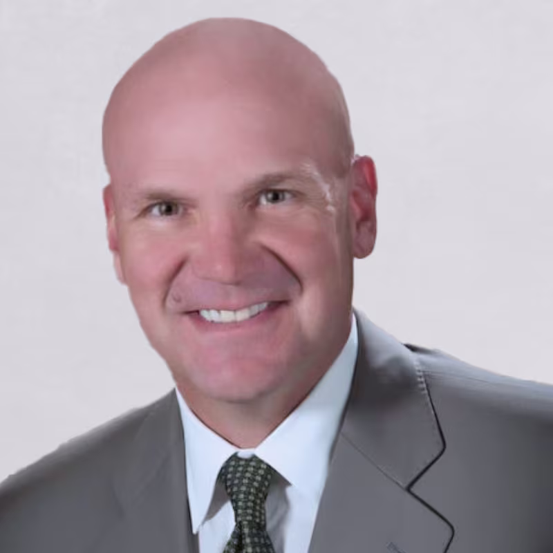 Headshot of Rehlko's strategic advisor Russ Minick
