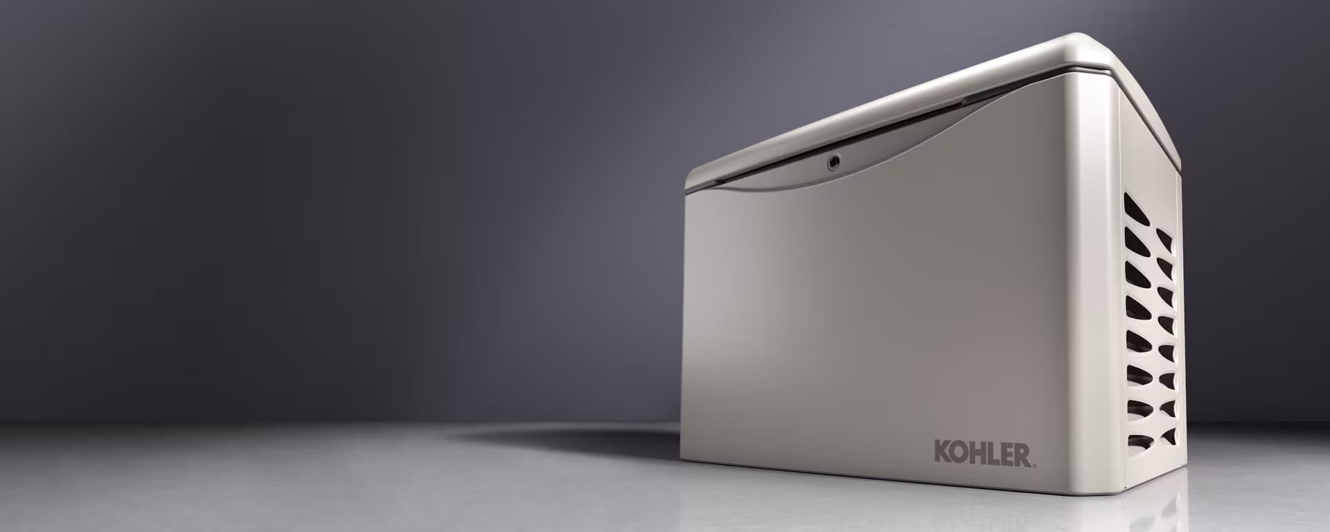 Beige generator with Kohler logo placed against a dark gray background.