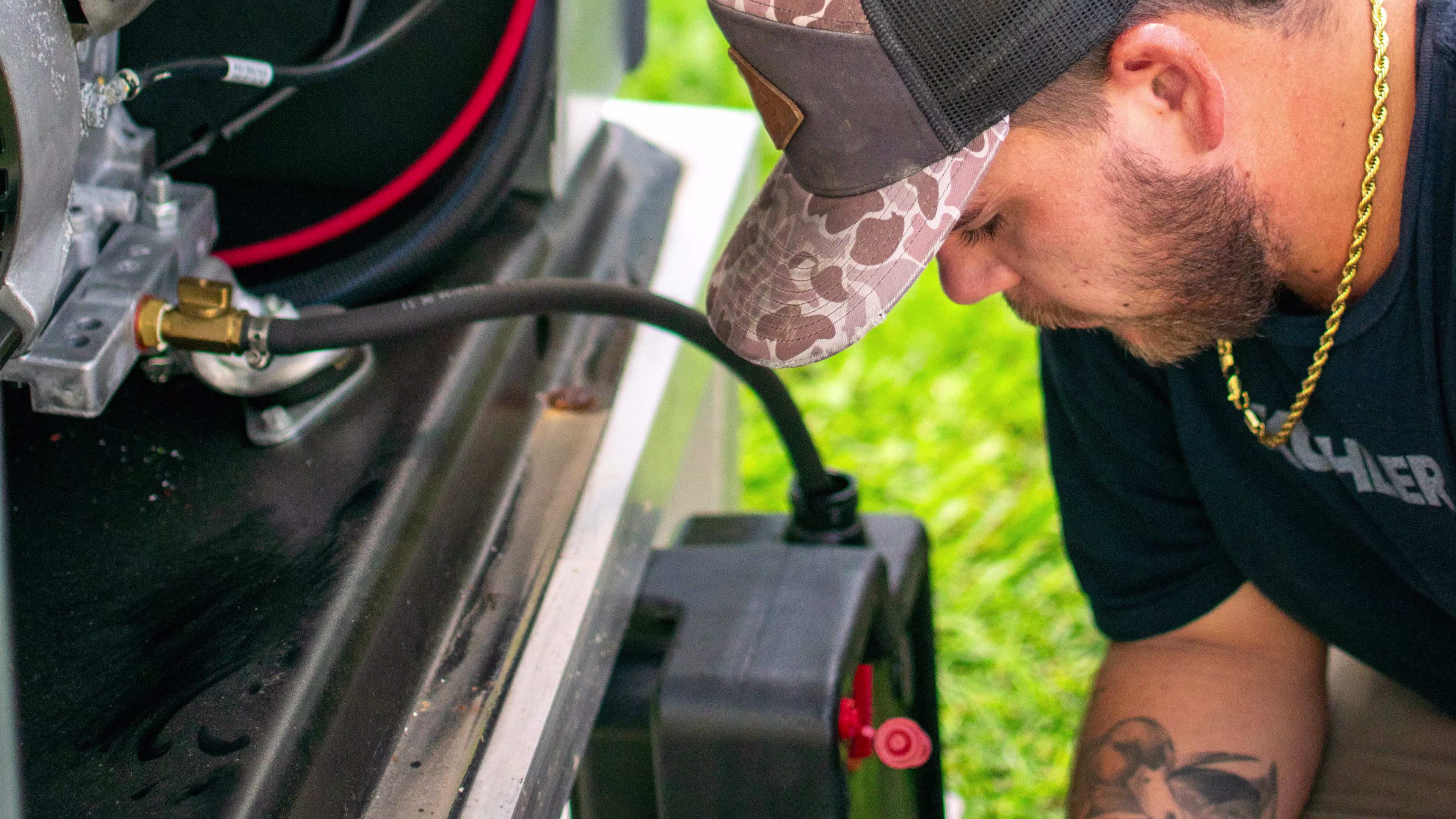Professional working on a generator with cables
