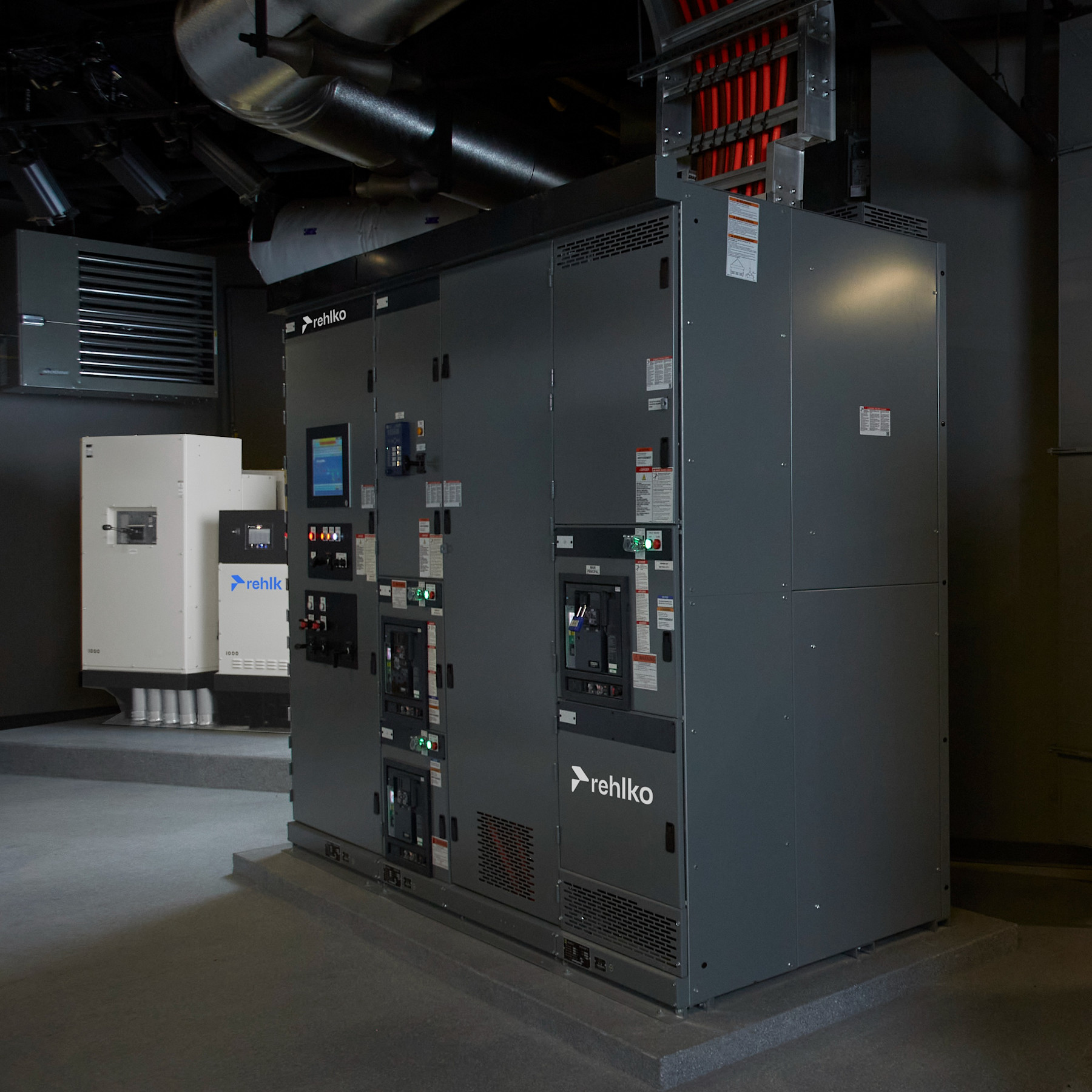 Side view of a Rehlko switchgear inside a building
