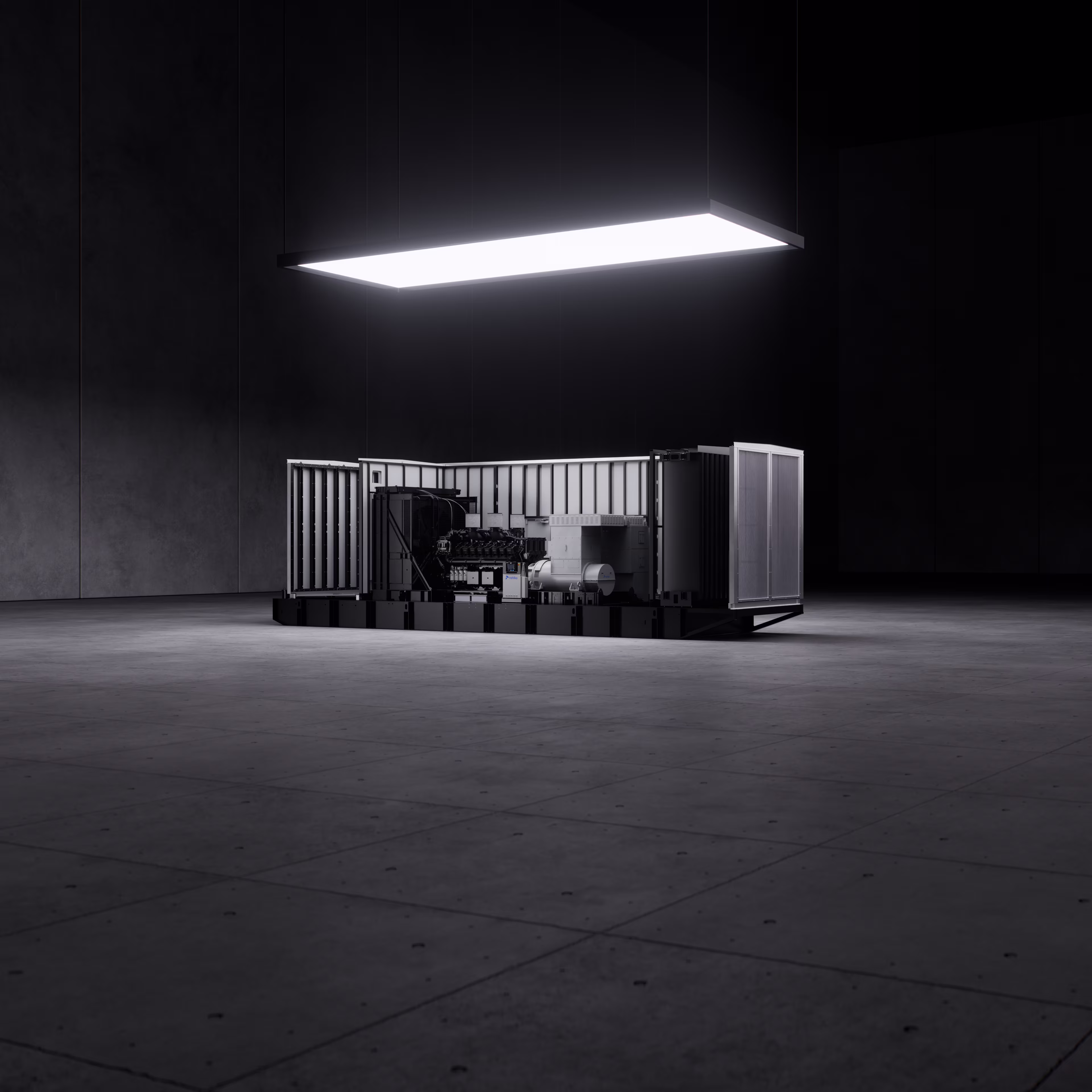 Industrial backup generator in an open enclosure under overhead lighting in a modern power facility.