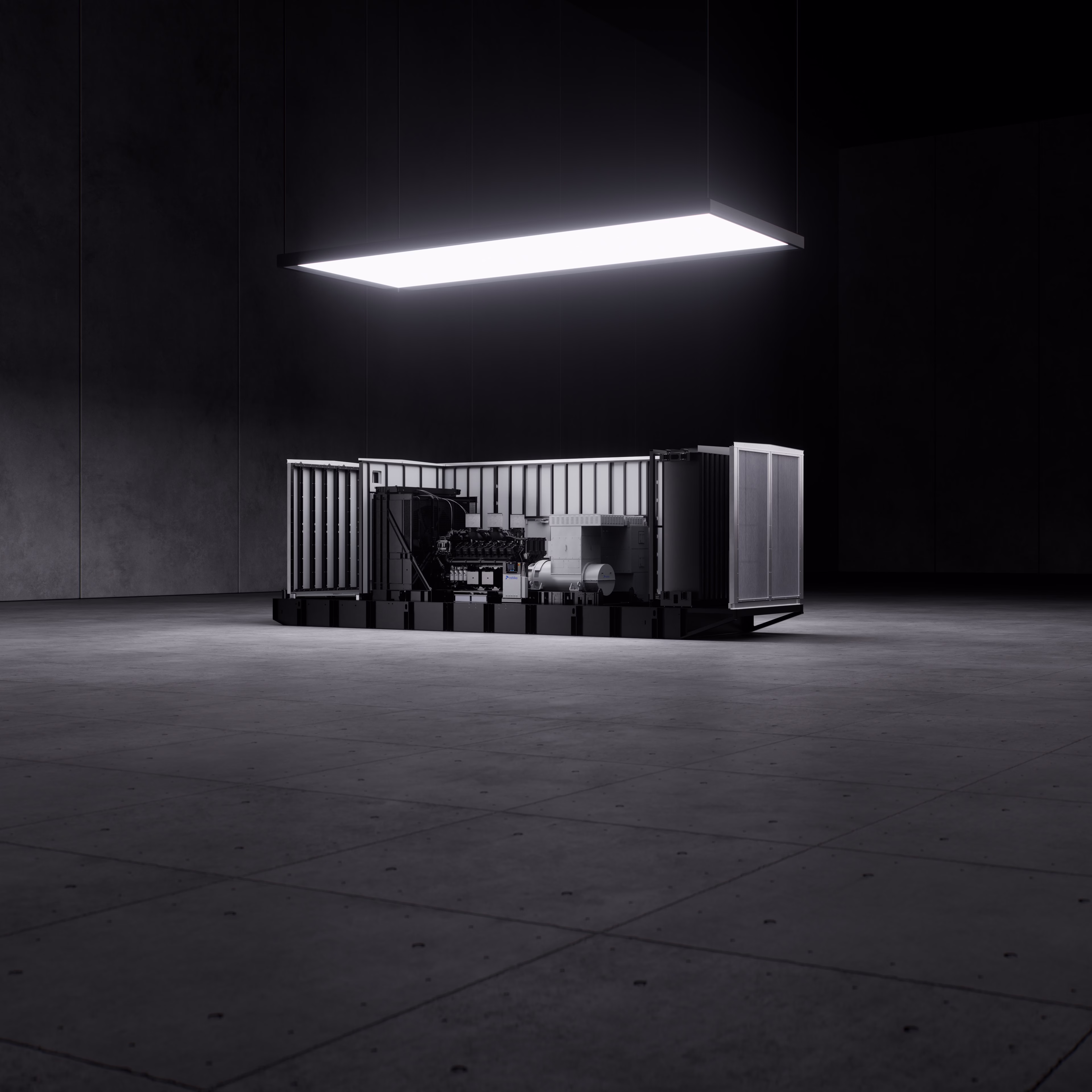 Industrial backup generator in an open enclosure under overhead lighting in a modern power facility.