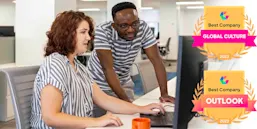 Software Engineer Kelly Smith with Global Sales Director Kelechi Okere in Elsevier's New York office.