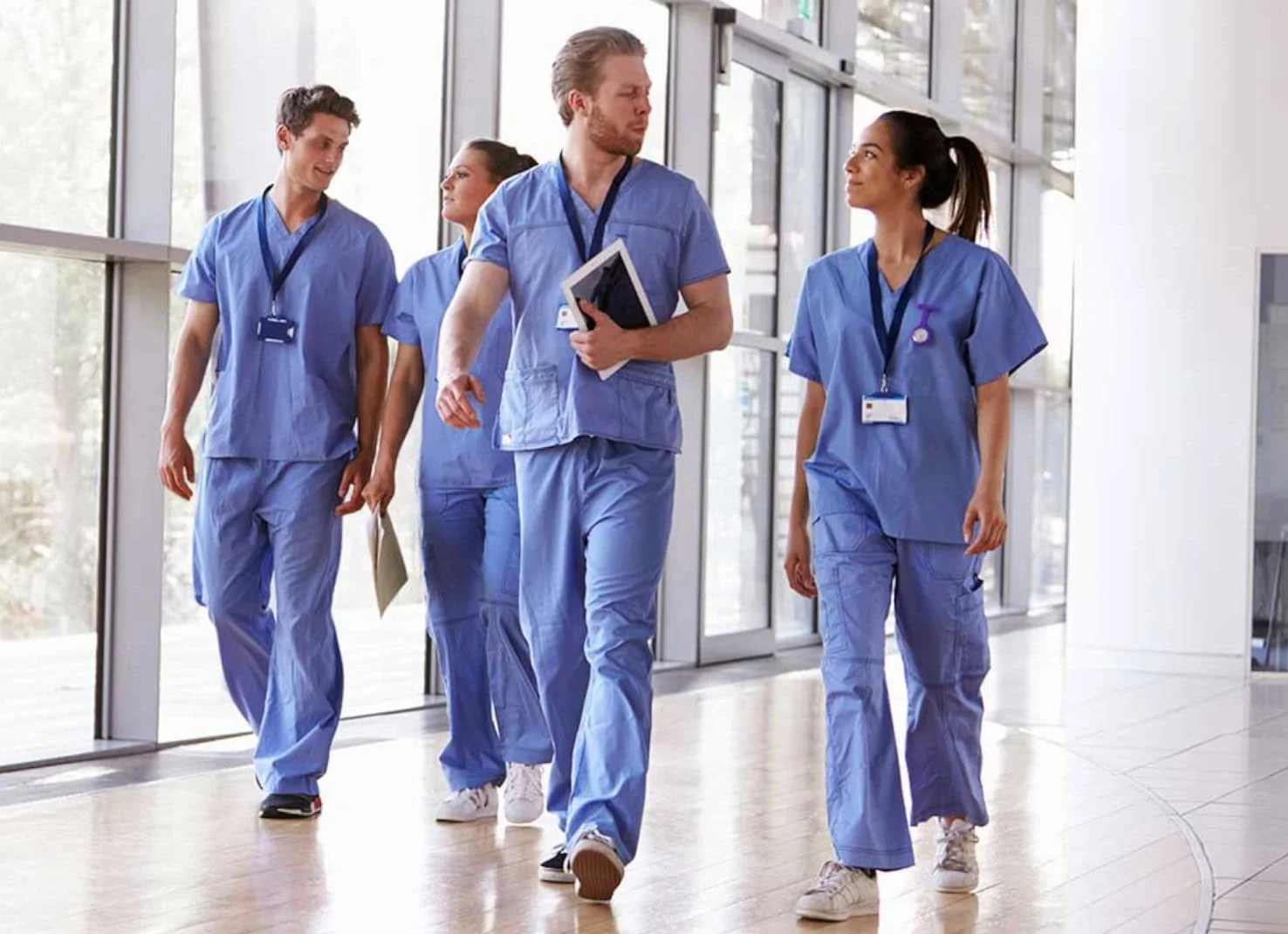 Group of novice nurses walking together