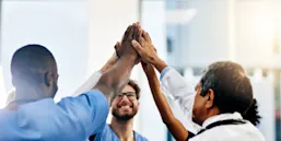 medical professionals celebrating