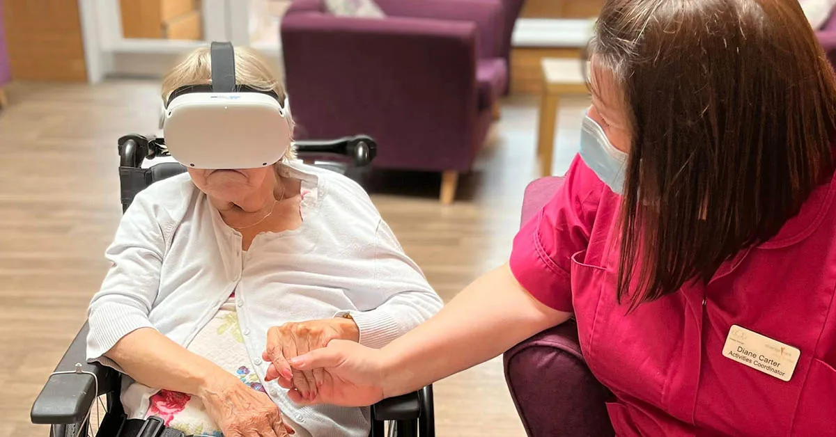 A resident in a UK care home experiences virtual reality as part of a study by Dr Samiya Khan