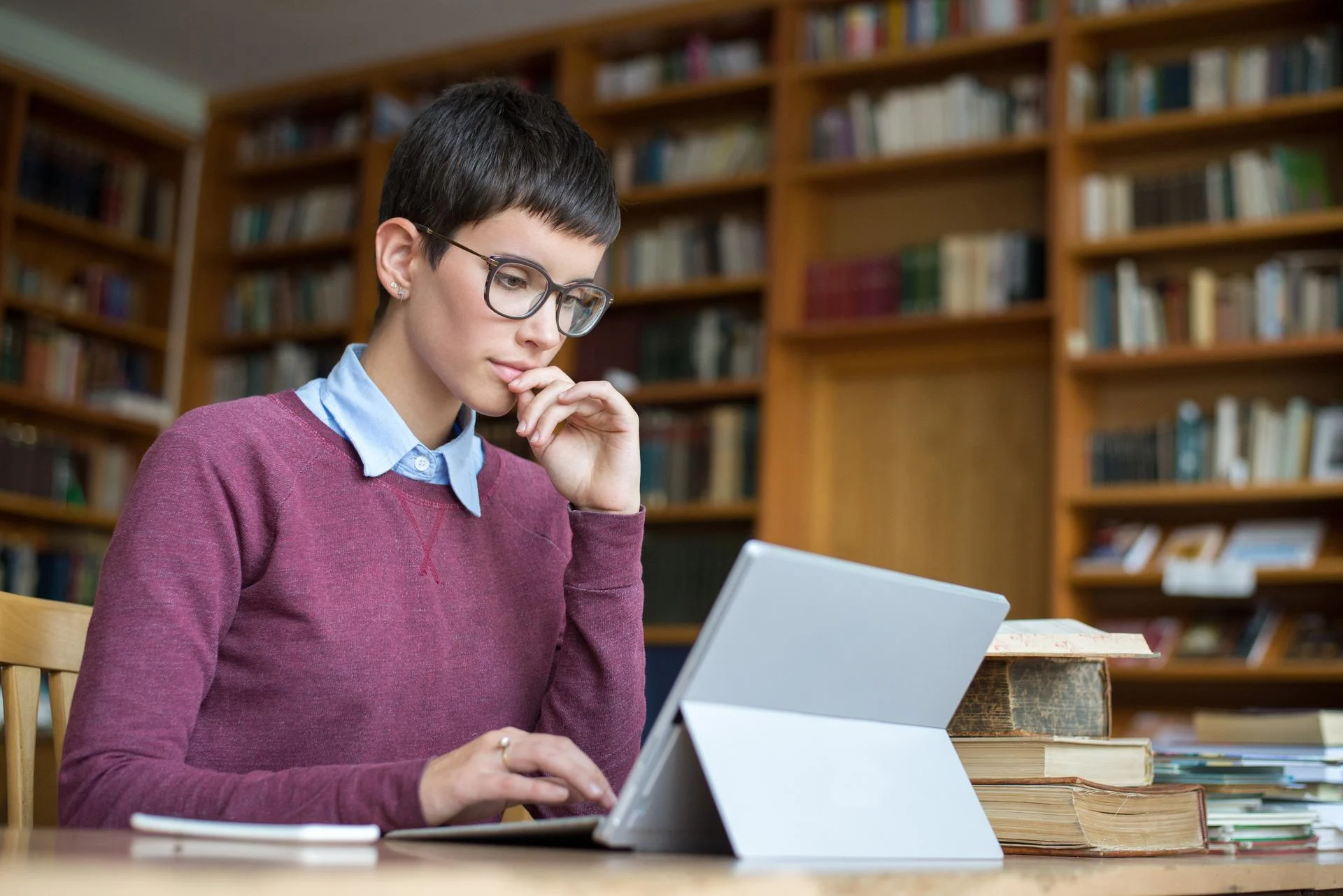 Young woman studying in the library