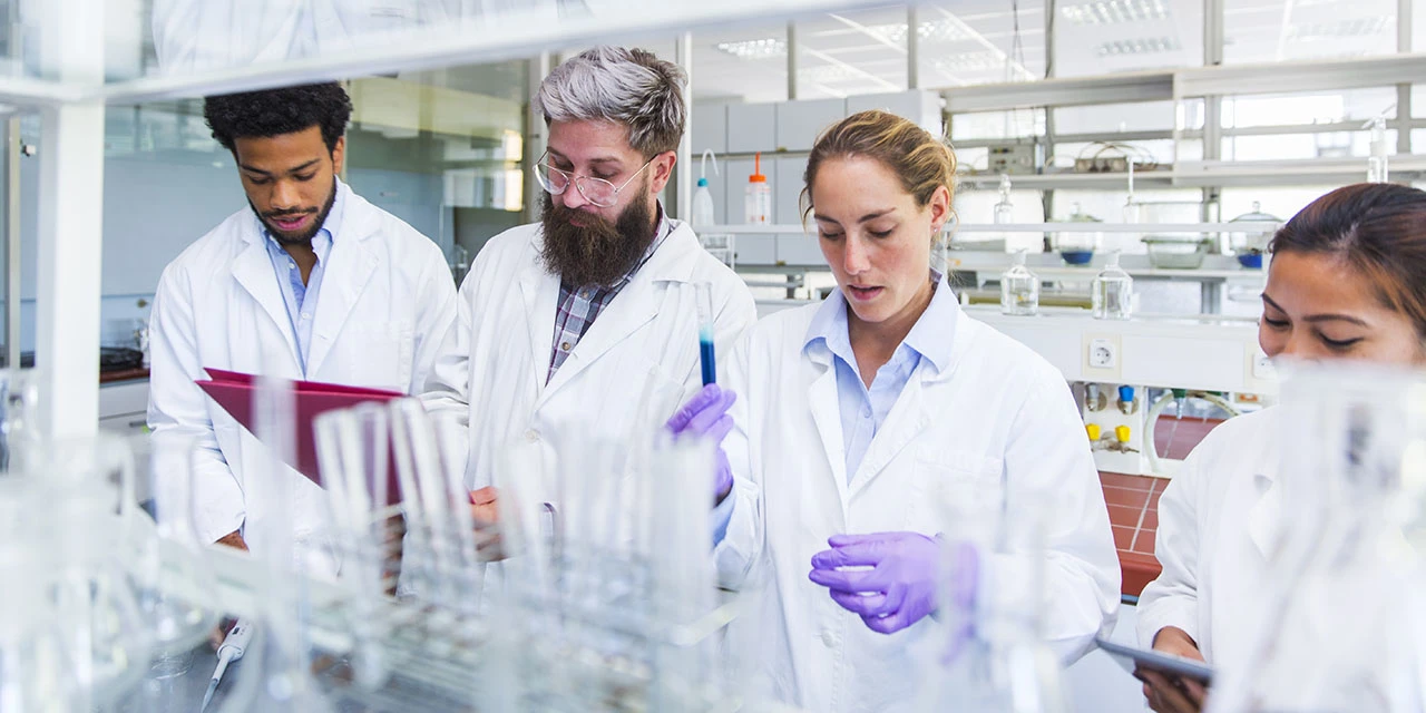 Photo depicting chemists (Source: choja/E+ via Getty Images)