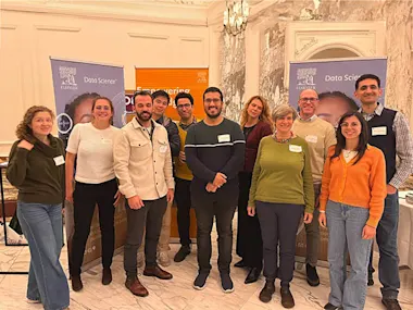 Group photo of Discovery Lab colleagues, including Lab coordinator Dr Anita de Waard of Elsevier