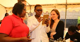 Nurses at Nyeri County Clinic, about 150km from Nairobi, Kenya, demonstrate how to use Amref’s Jibu app to stay updated on the latest nursing treatments in different fields, including tuberculosis.