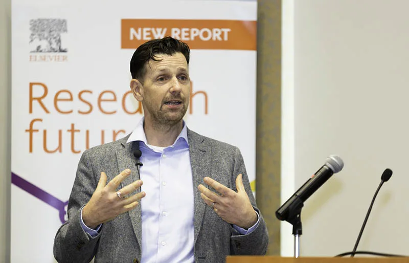 Adrian Mulligan, Research Director for Customer Insights at Elsevier, presents the original Research Futures report at the AAAS Annual Meeting in 2019. (Photo by Alison Bert)