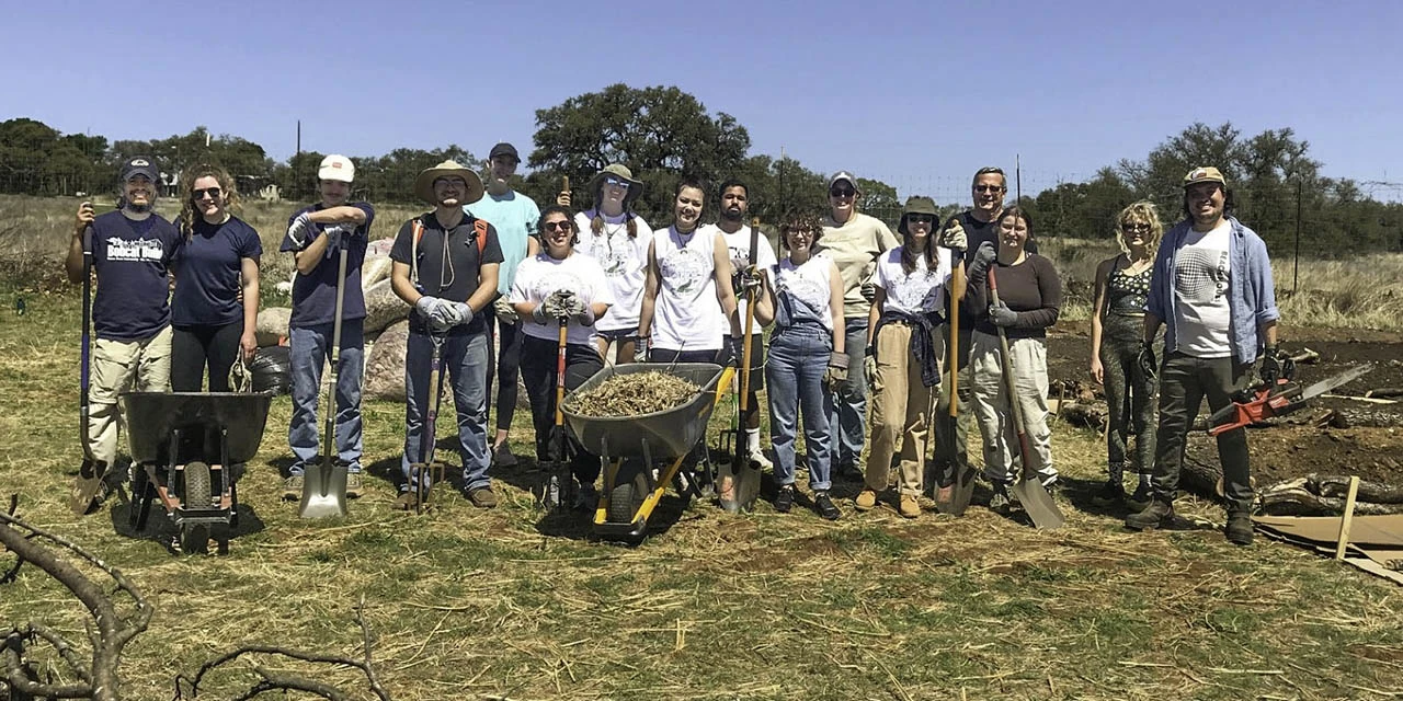 Students and founding donor Andrew McGown, fourth from the right, at Texas State University’s student-run fruit and vegetable farm, Bobcat Farm, which is managed by the author. (Photo by Nicole Wagner)