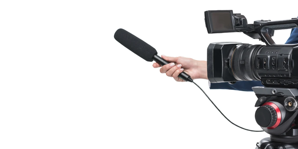 video camera and microphone on white background