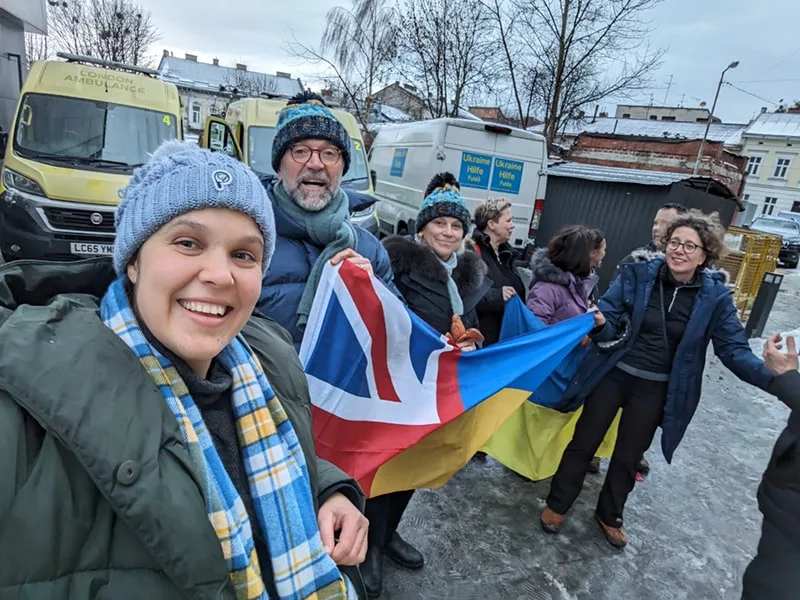 Recently, Maria (far left) traveled to Lviv with Medical Life Lines Ukraine, where they delivered decommissioned NHS ambulances full of humanitarian aid including food and emergency medical supplies. 