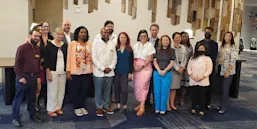 The Board of the Society for Scholarly Publishing (SSP) Author Simon Holt is on the far left and author Meredith Adinolfi is in the blue pants. 