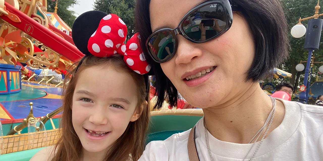 Lingni Priestley, a Director of Product Management for Elsevier's ScienceDirect team, enjoys Shanghai Disneyland with her daughter Freya.