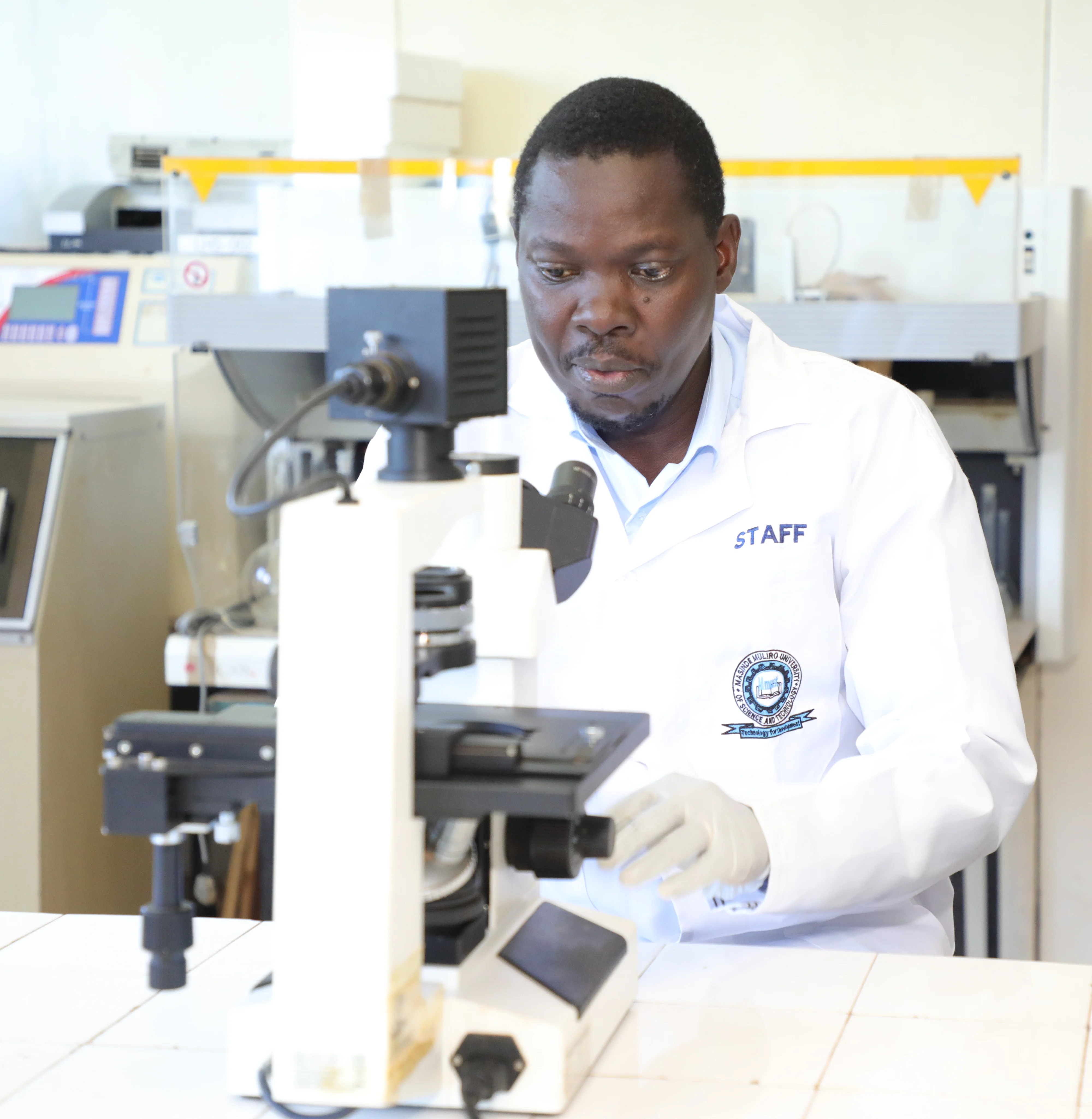 Dr Dennis Ochieno ion the Lab