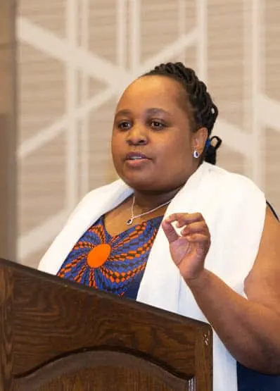 Chao Mbogo, PhD, Lecturer in Computer Science at Kenya Methodist University, accepts her award at the 2020 Annual AAAS Meeting in Seattle. (Photo by Alison Bert)