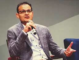 Photo depicting a farmer using a digital tablet while working on organic sustainable farm to cultivate vegetation in agribusiness. (pixdeluxe/E+ via Getty Images)