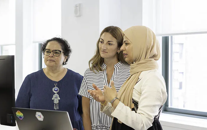 Ghada Captan, Kelsey Conners and Hanan Teleb working together