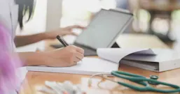 nurse-writing-in-notebook