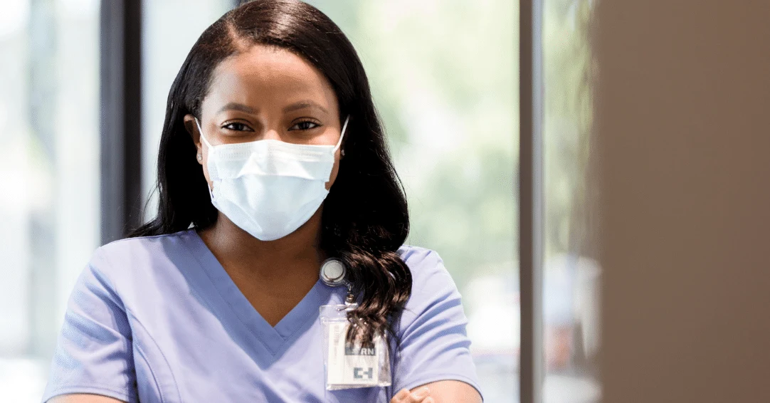 Female nurse wearing a face mask