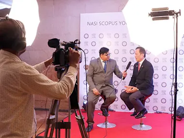 Vishal Gupta interviews Elsevier Chairman YS Chi at the NASI Scopus Young Scientist Awards in India, hosted by Elsevier and the National Academy of Sciences in India. 