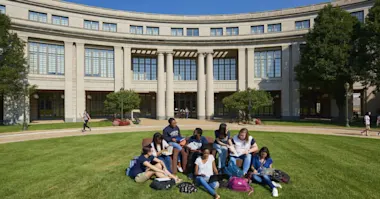 Group of students sitting outside Western Reserve University