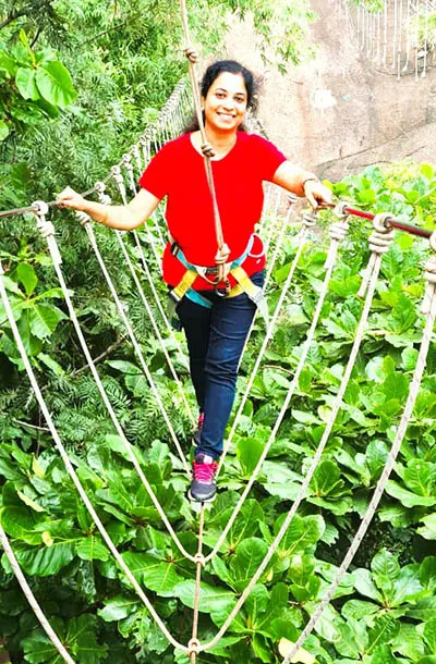Geetha Ramadevi on a rope course at a team outing: “I am always open to taking on any challenge!” she says.